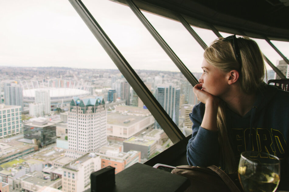 girl looking out onto vancouver view