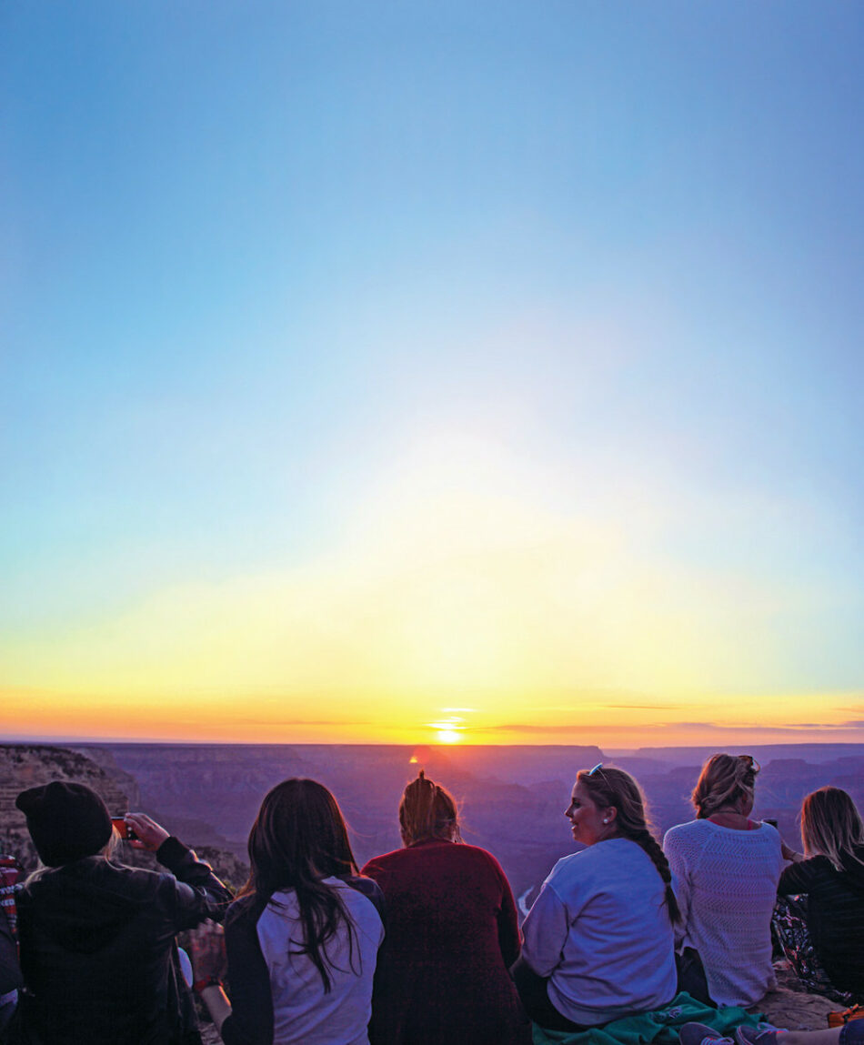 College students looking at sunset