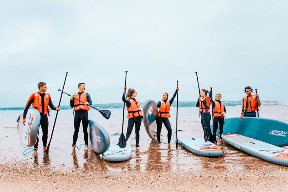 Paddleboarding with friends in Portugal