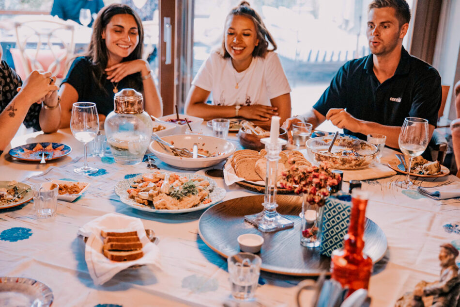 Friends eating together, Portugal