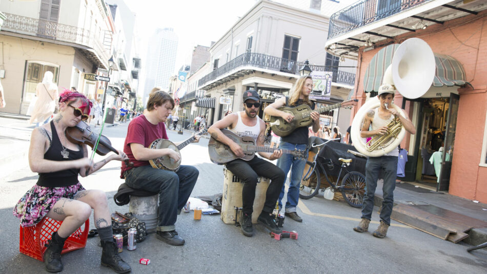 group playing music in street