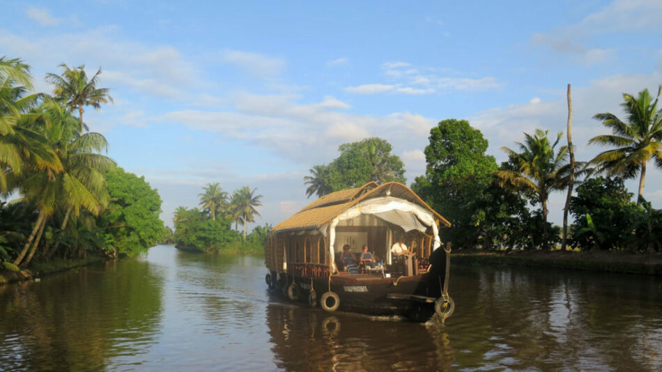 A Contiki boat tour traveling down a river with special stays.