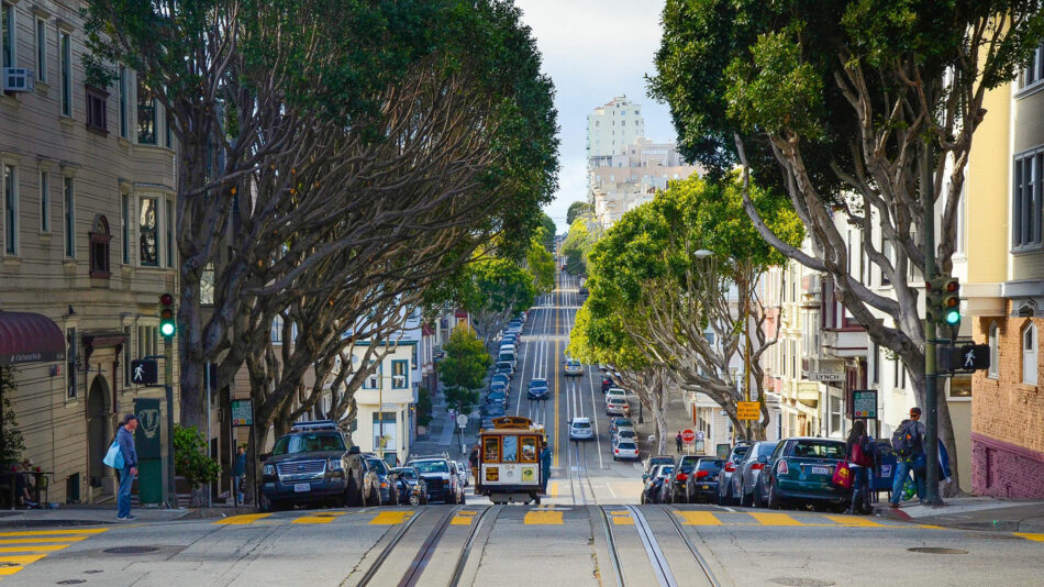 Cable car on a street in San Francisco, California near camp in Yosemite.