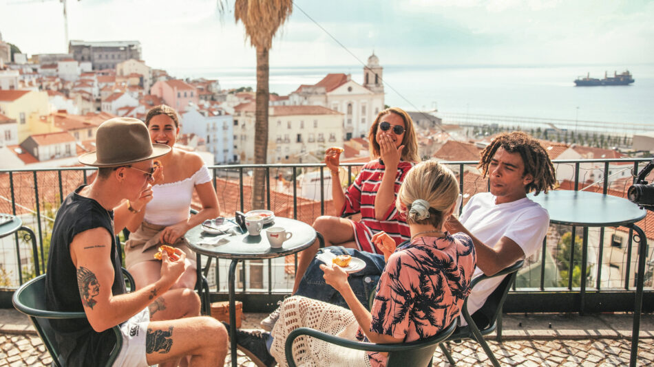 Group of friends eating in Portugal