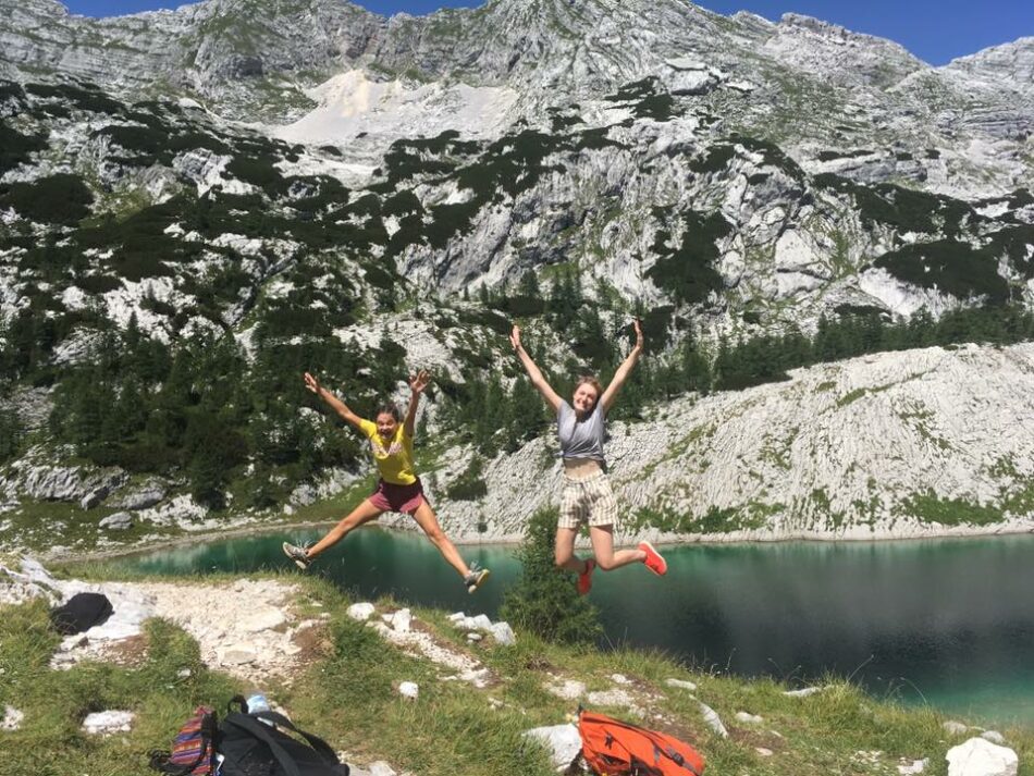 Girls-jumping-into-Slovenia-Lake