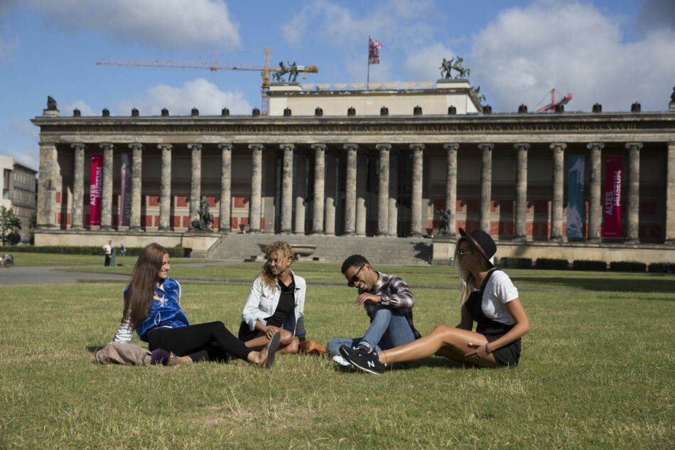 Friends on grass in Berlin