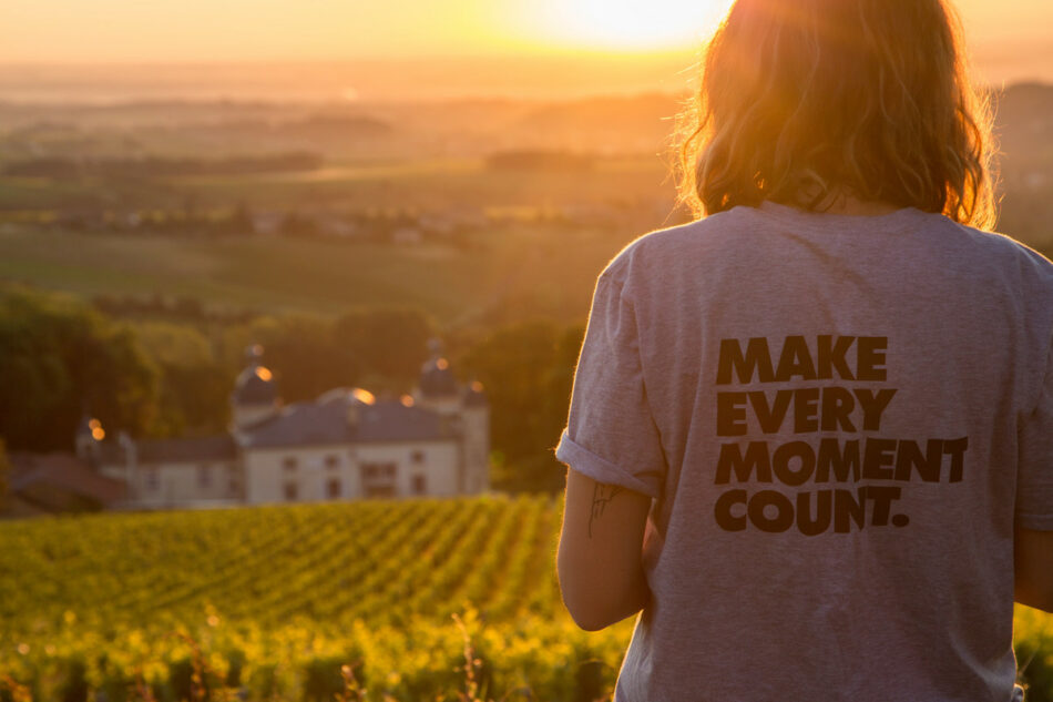 A woman wearing a t-shirt that says 