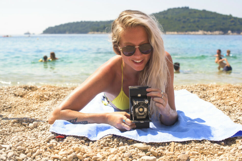 Girl relaxing on Croatian beach - things to do in croatia