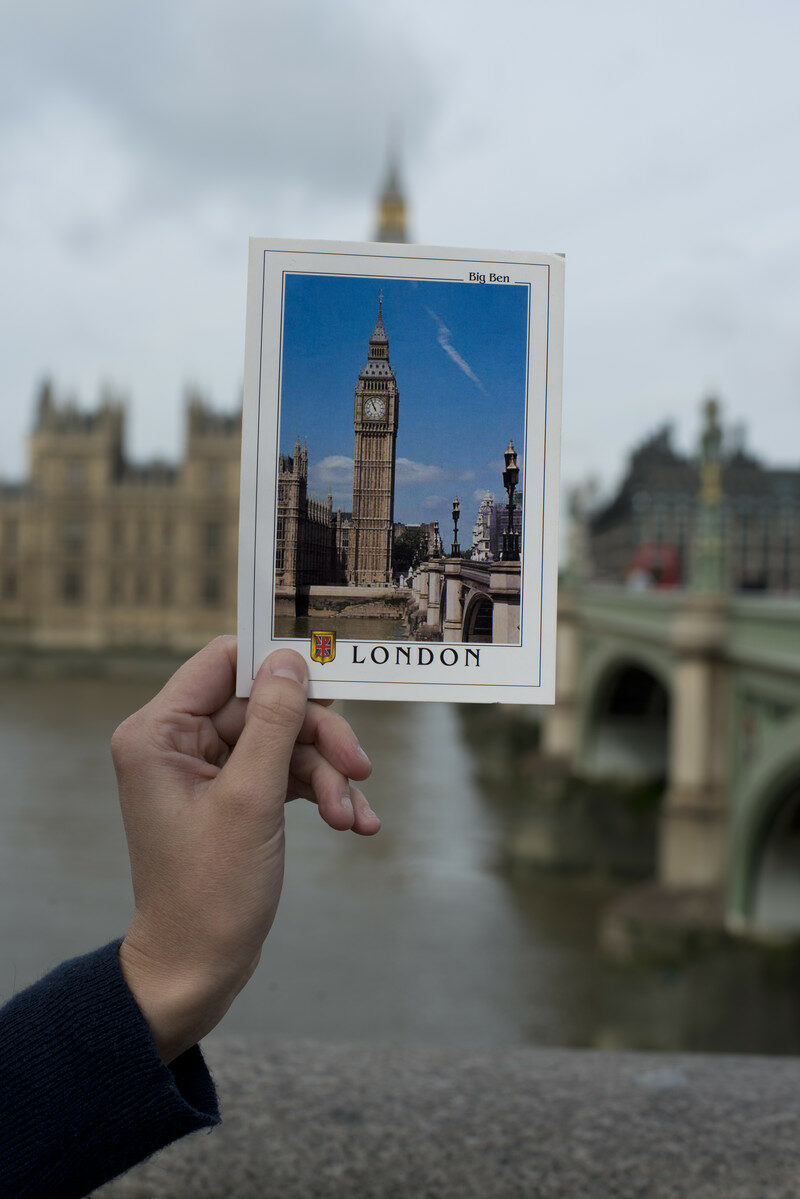 A person showcasing how travel has changed with a picture of Big Ben in London.