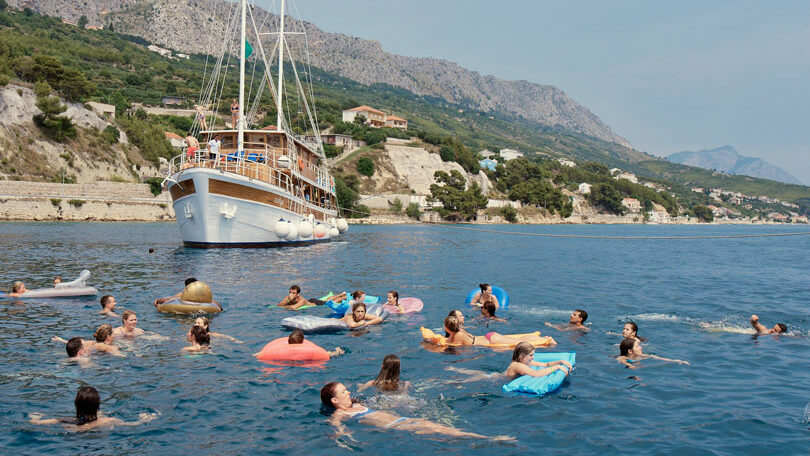 group of travellers in the sea off the coast of Croatia