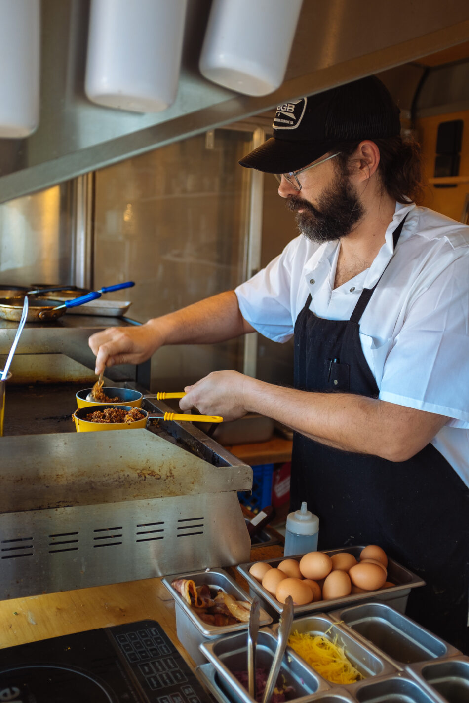 A man preparing food in a Austin kitchen.