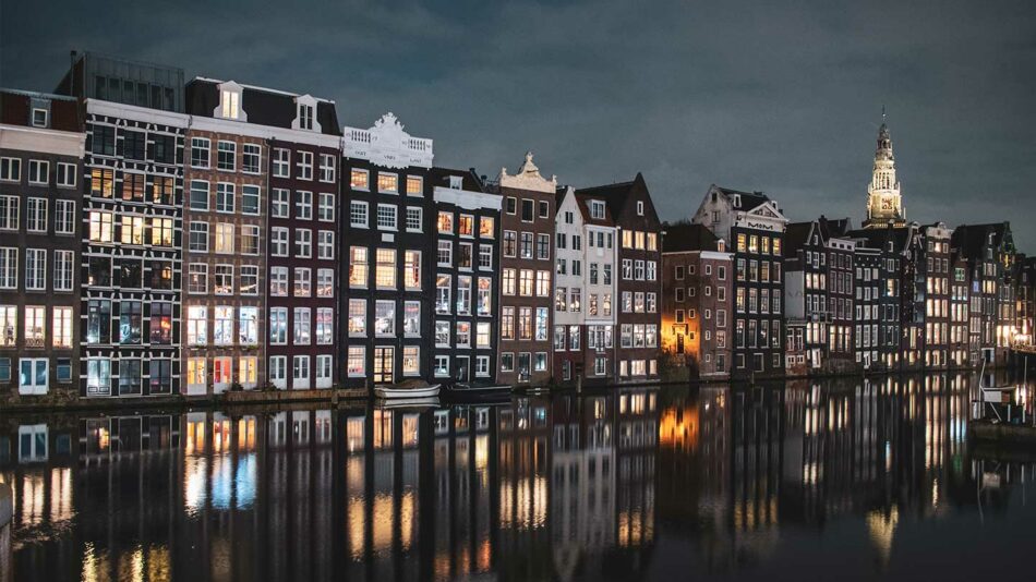 Amsterdam is one of the 15 best places to visit in October and is a great place to visit at night.