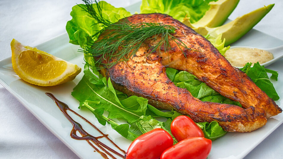 carp served with salad. One of the most unusual Christmas foods in the world