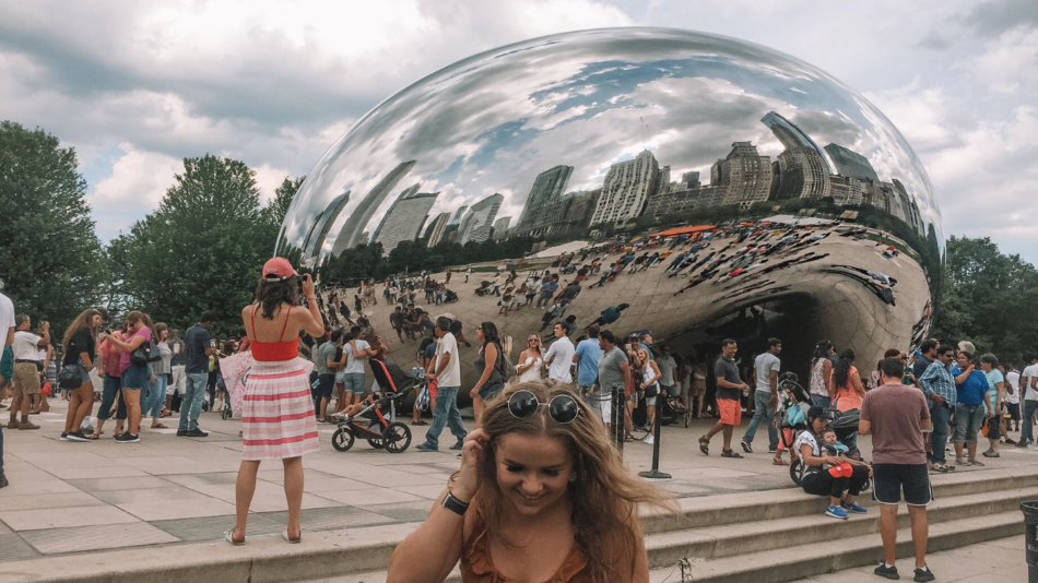 Girl in front of Chicago bean attraction