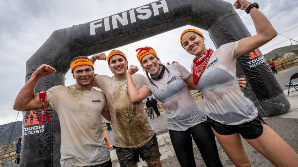 Contiki travellers doing a Tough Mudder