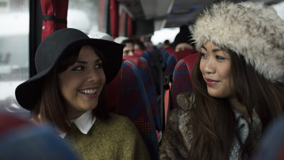 Contiki-coach-girls-talking-road-trip