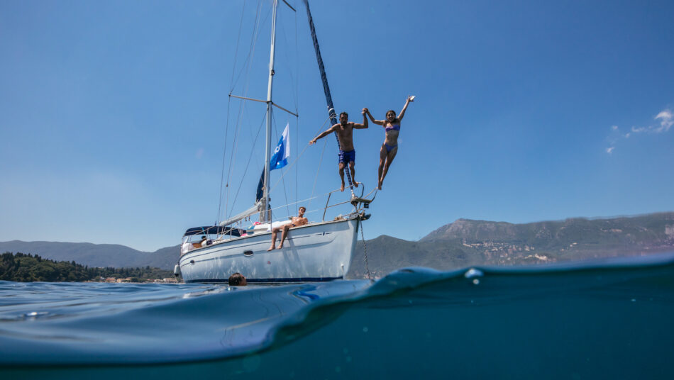 Corfu Greece jumping in ocean off boat