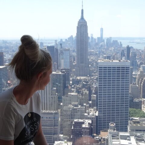 Girl looking onto New York