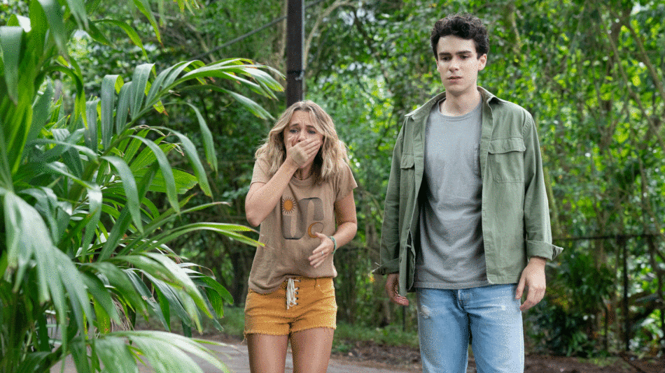 A man and a woman standing next to each other on a path, reflecting on their 