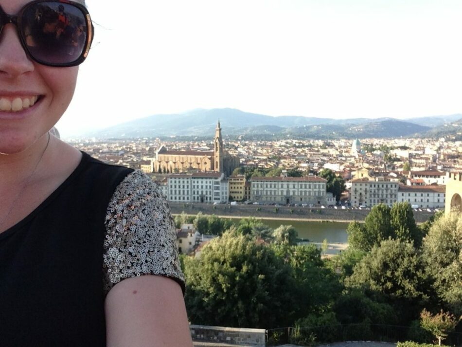 Girl against Italy landscape backdrop