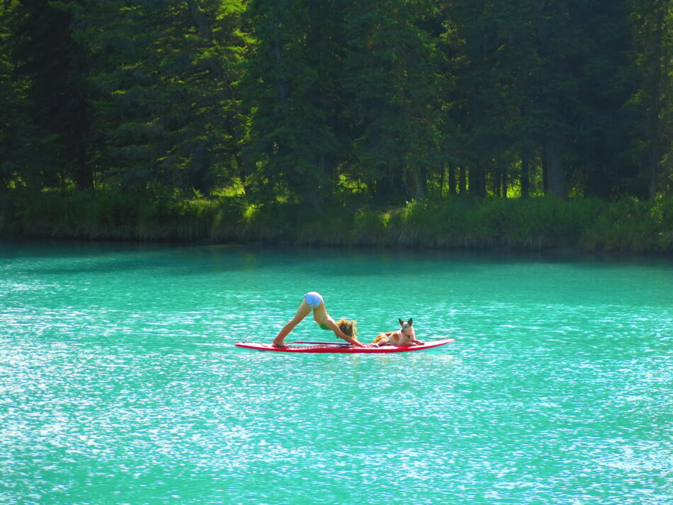 Image of Banff - Bow lake and girl doing yoga