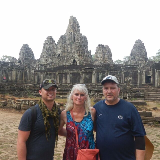 Walt with his parents in cambodia