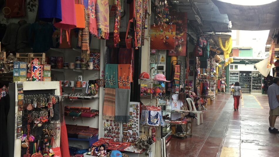 An eco-friendly alley with a lot of colorful travel souvenirs.