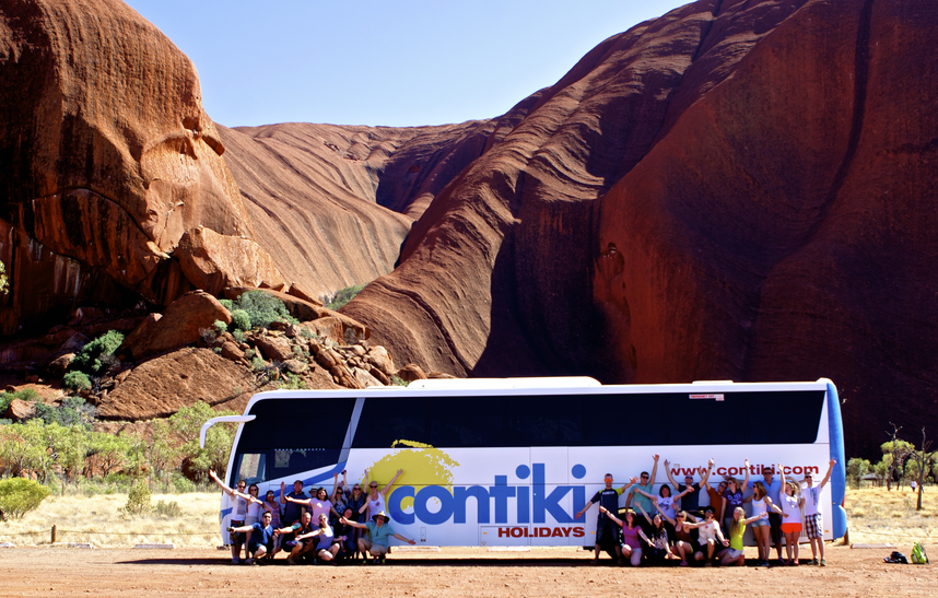 Contiki bus in front of Uluru - Australia