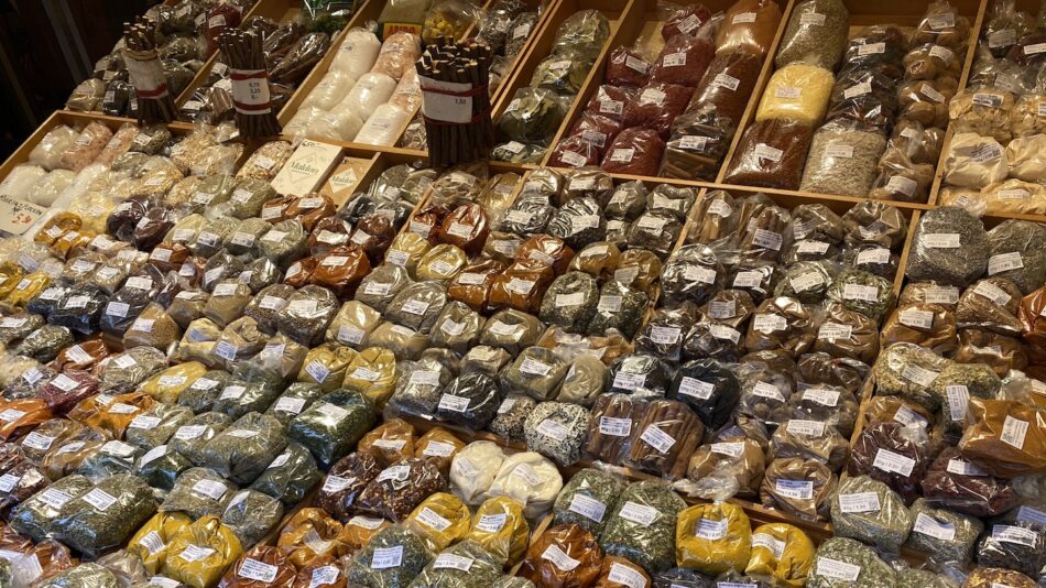 A store showcases a wide variety of eco-friendly spices, perfect for travelers in search of a unique souvenir.