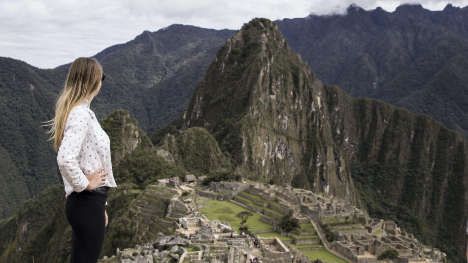 Machu Picchu woman looking at scenery