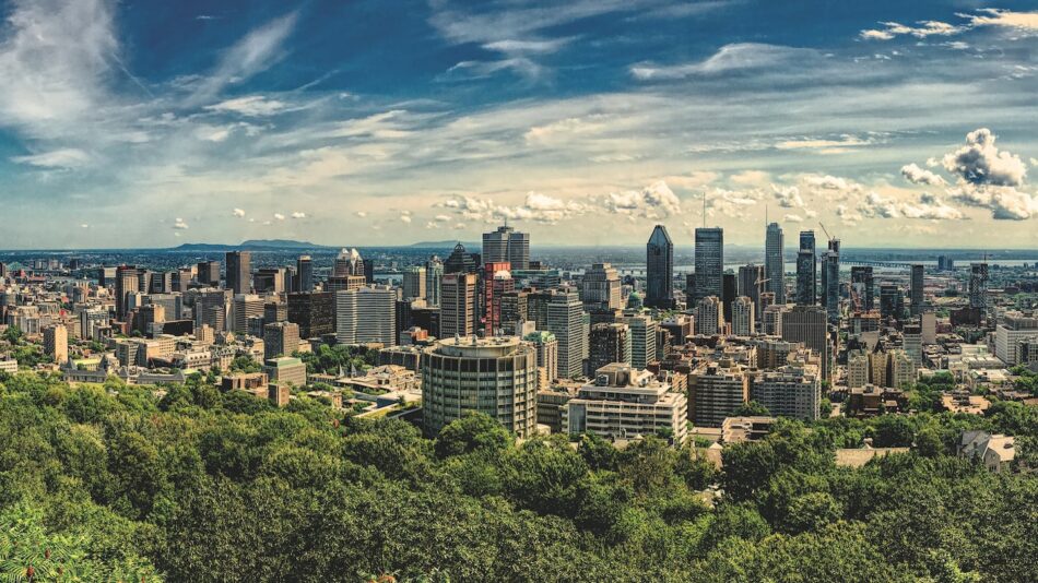 A view of the city of quebec from the top of a hill.