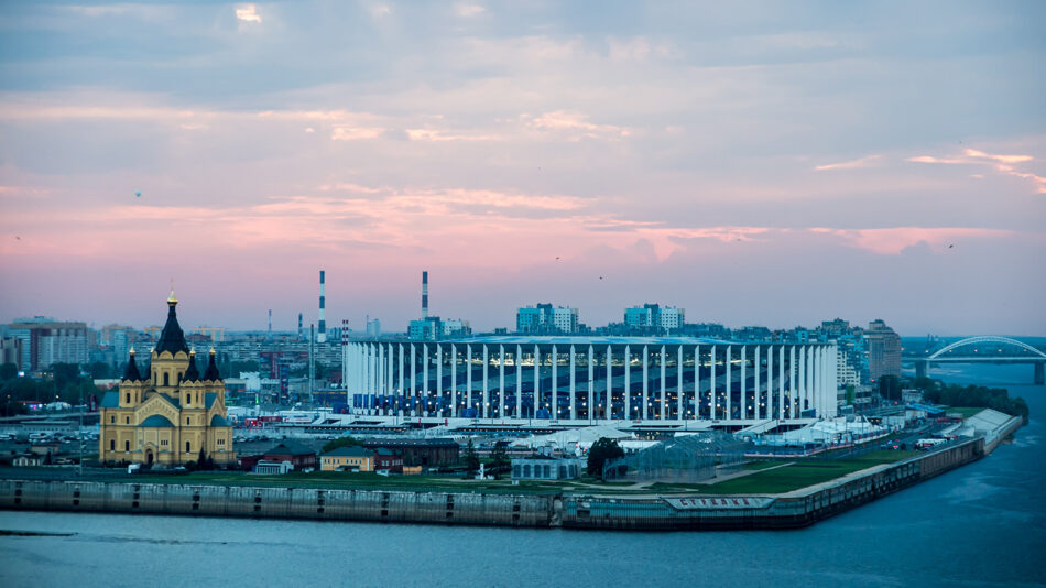 An aerial view of a city at sunset.