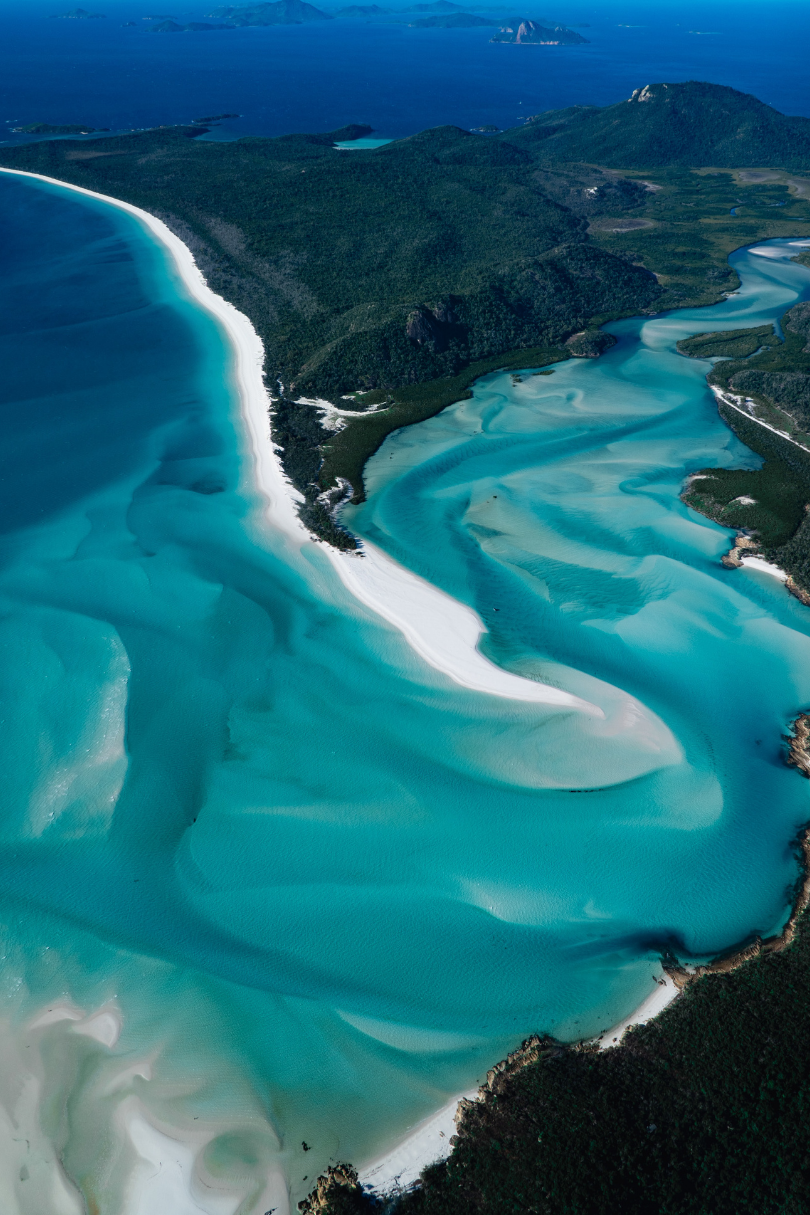 An aerial view of whitehaven beach, one of the best places to visit in Australia.