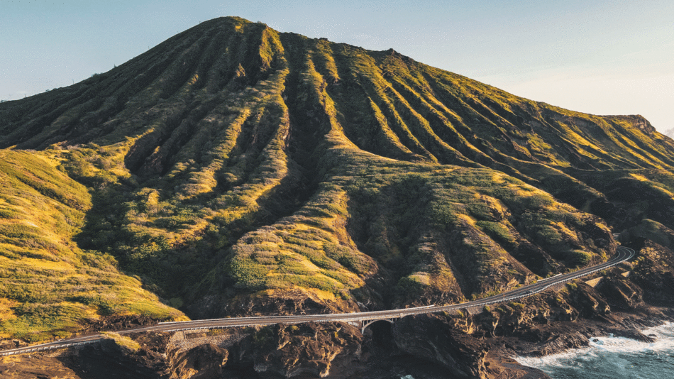 An aerial view of a mountain showcasing one of the hidden gems in Hawaii.