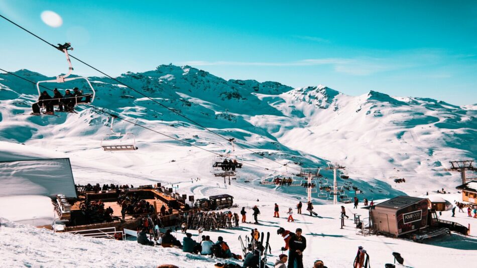 A group of people enjoying the slopes at one of the best ski resorts in Europe.