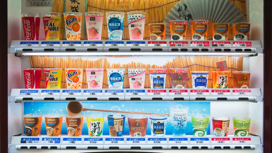 A vending machine with a variety of drinks.