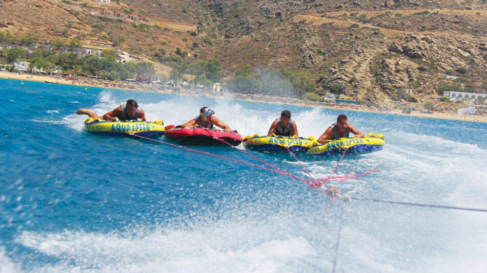 Europe's best adventure activities include a group of people on water skis enjoying an exhilarating ride.