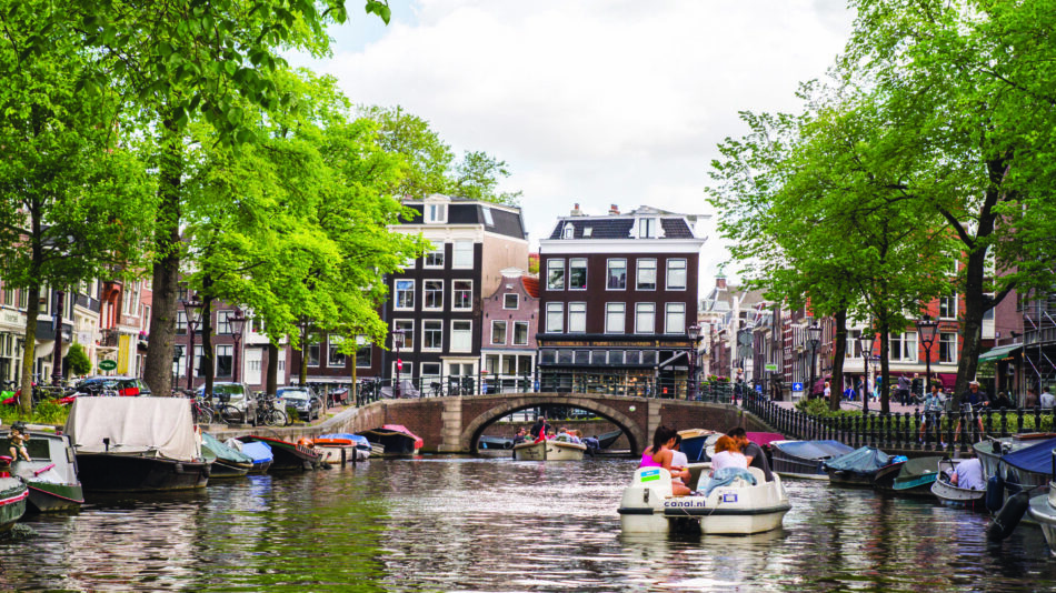 The best summer destination in Europe - Amsterdam, known for its picturesque canals.