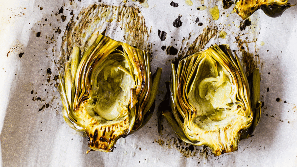 Thanksgiving alternative - Roasted artichokes on a baking sheet.