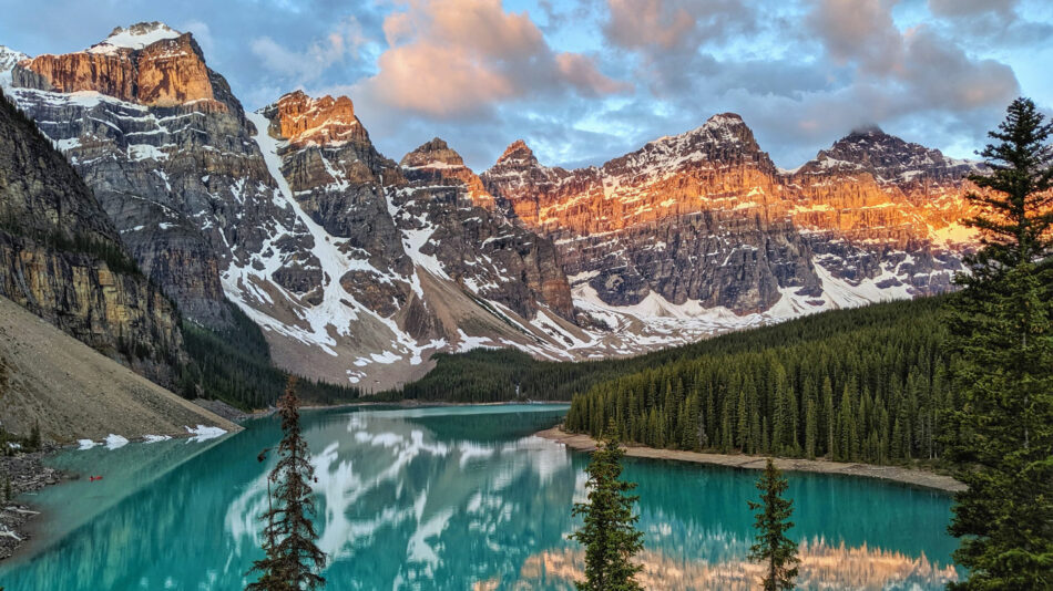 The most beautiful mountains are reflected in a lake in Banff National Park, one of the most beautiful places in the world.