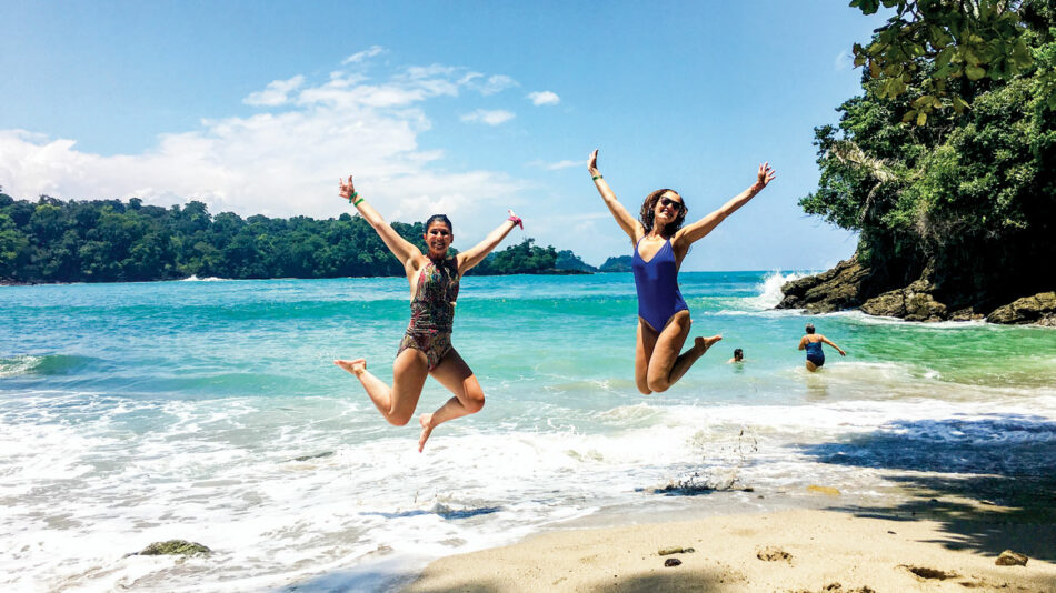 girls on beach in costa rica