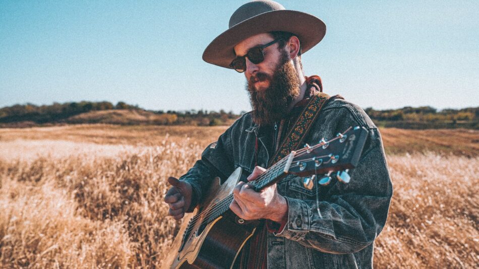 Man playing guitar in Texas