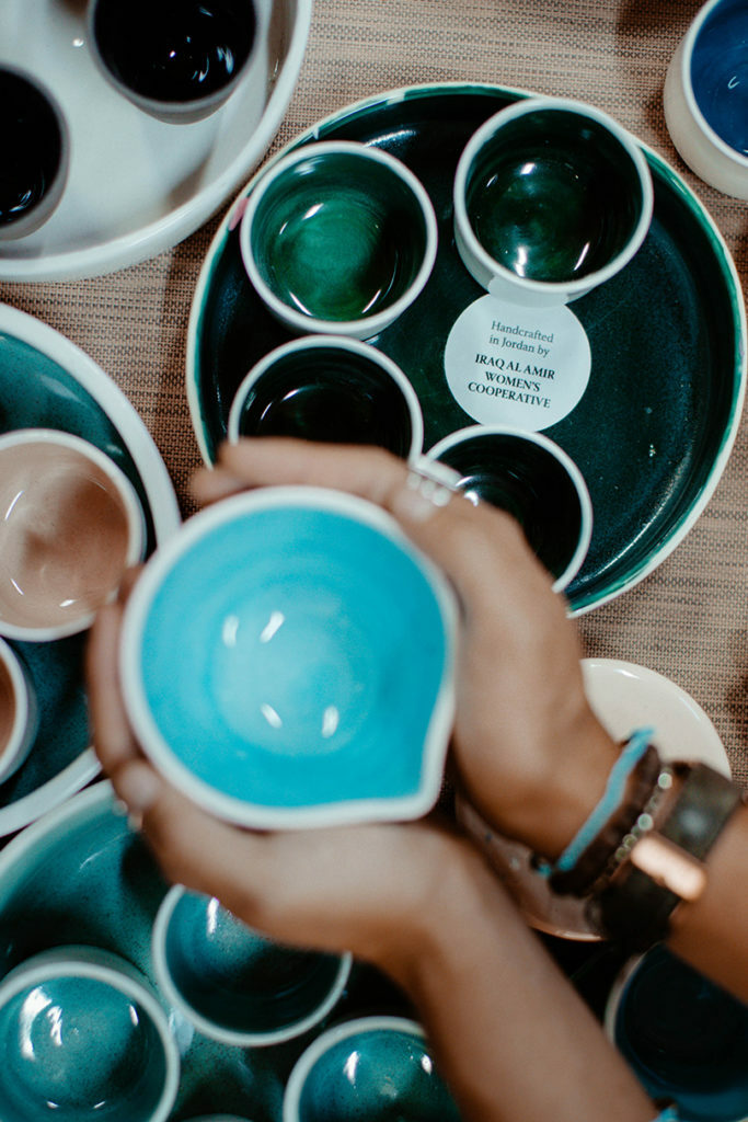 A person packing a bowl for holiday.