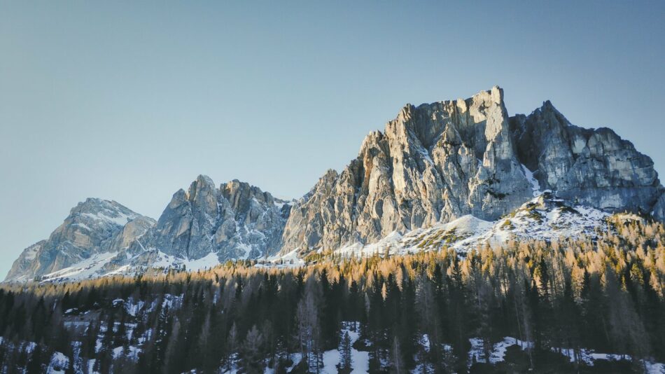 A snow-covered mountain range with stunning trees, perfect for the best ski resorts in Europe.