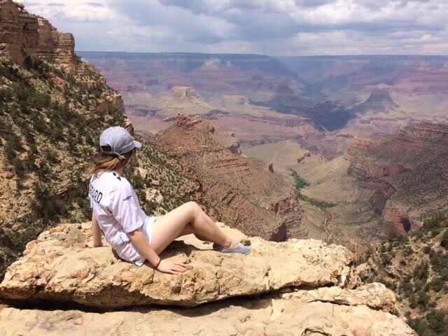 A woman gazes at the grand canyon, one of the top stories of 2017.