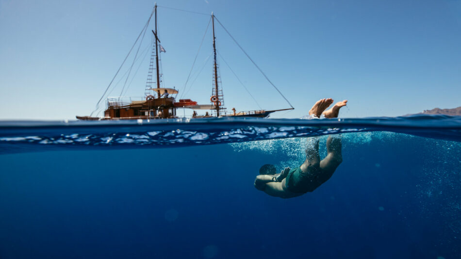 person swimming in the aegean sea, greece