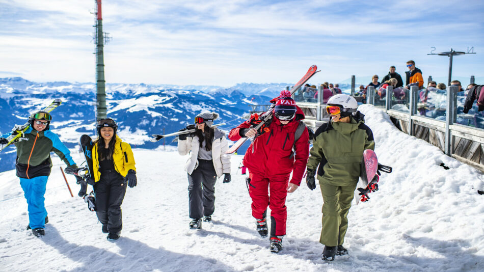 group of happy skiers in hopfgarten, austria