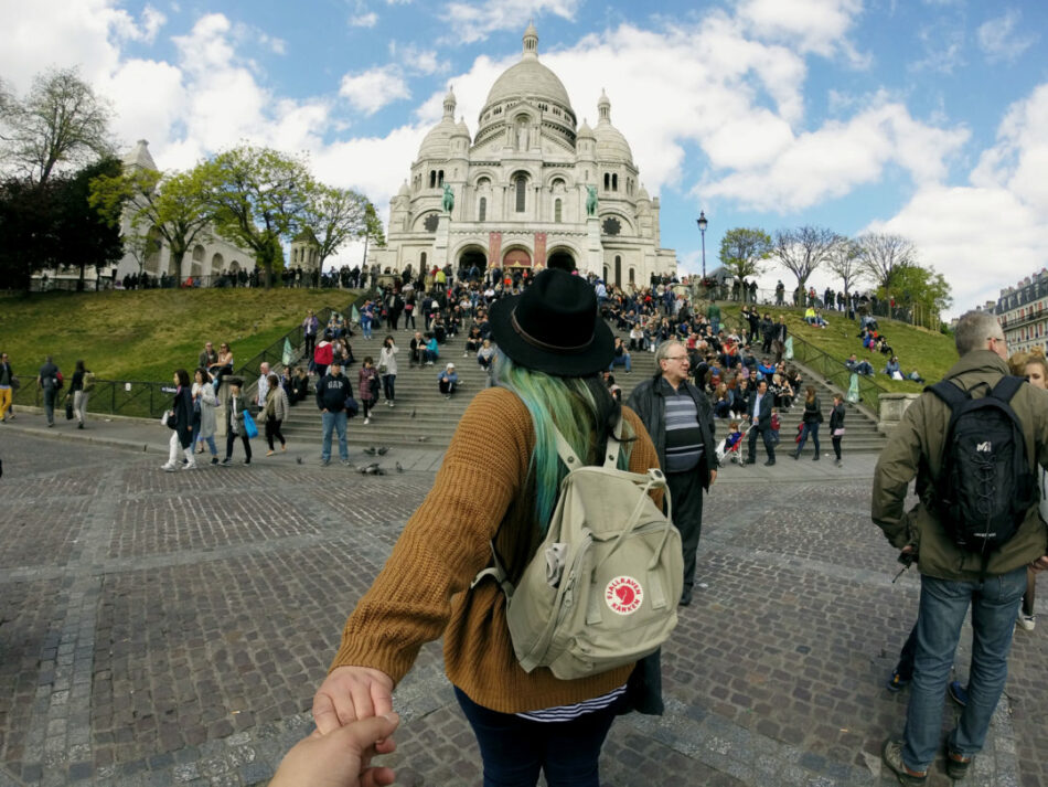 Girl-pulling-hand-to-Notre-Dame