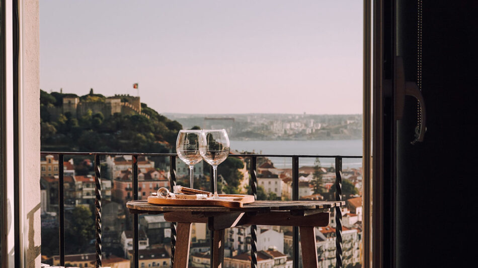 A balcony overlooking the sea in Lisbon ,Portugal - one of the most vegan friendly-cities in the world