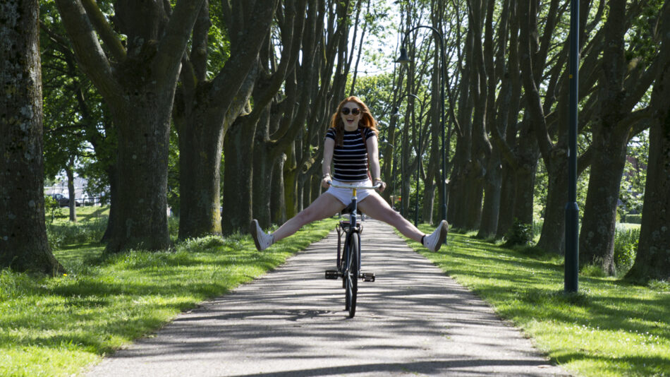 new years resolutions - girl riding bike in amsterdam